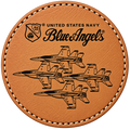 A round rawhide leatherette coaster featuring black laser engraved graphics of four fighter jets and the United States Navy Blue Angels logo and name, finished with black contrast stitching.